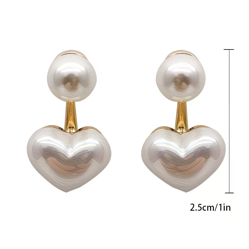 Heart-shaped earrings with double pearl