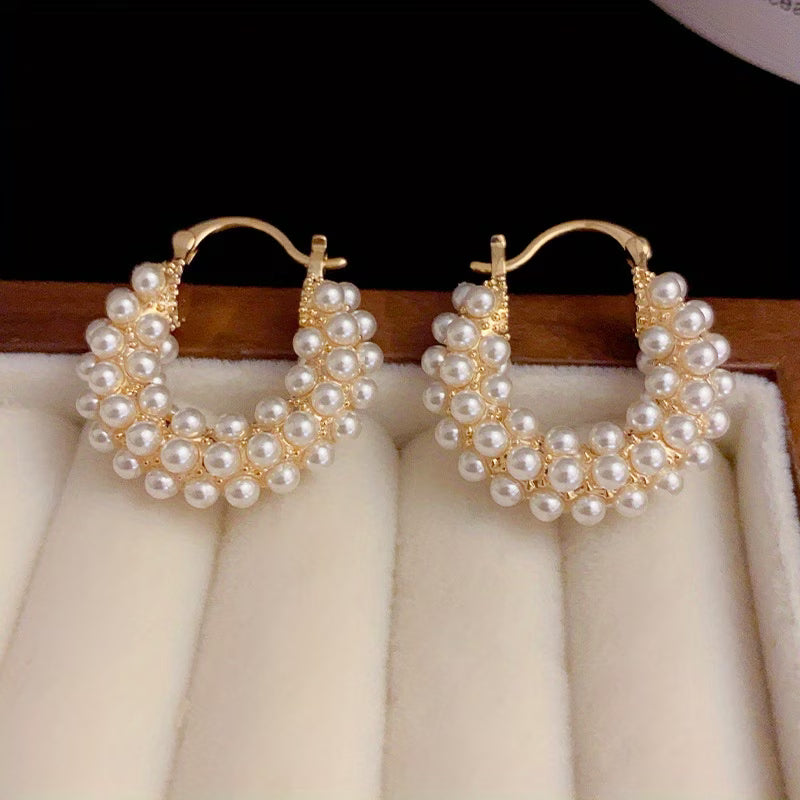 Hoop earrings with layered pearls