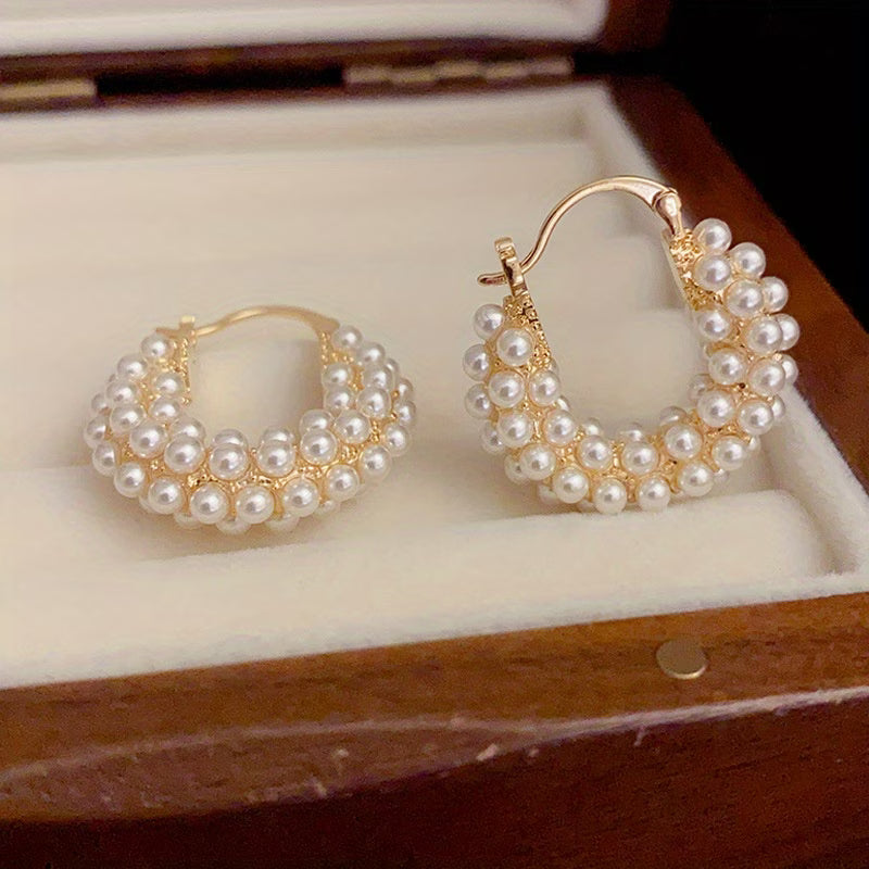 Hoop earrings with layered pearls