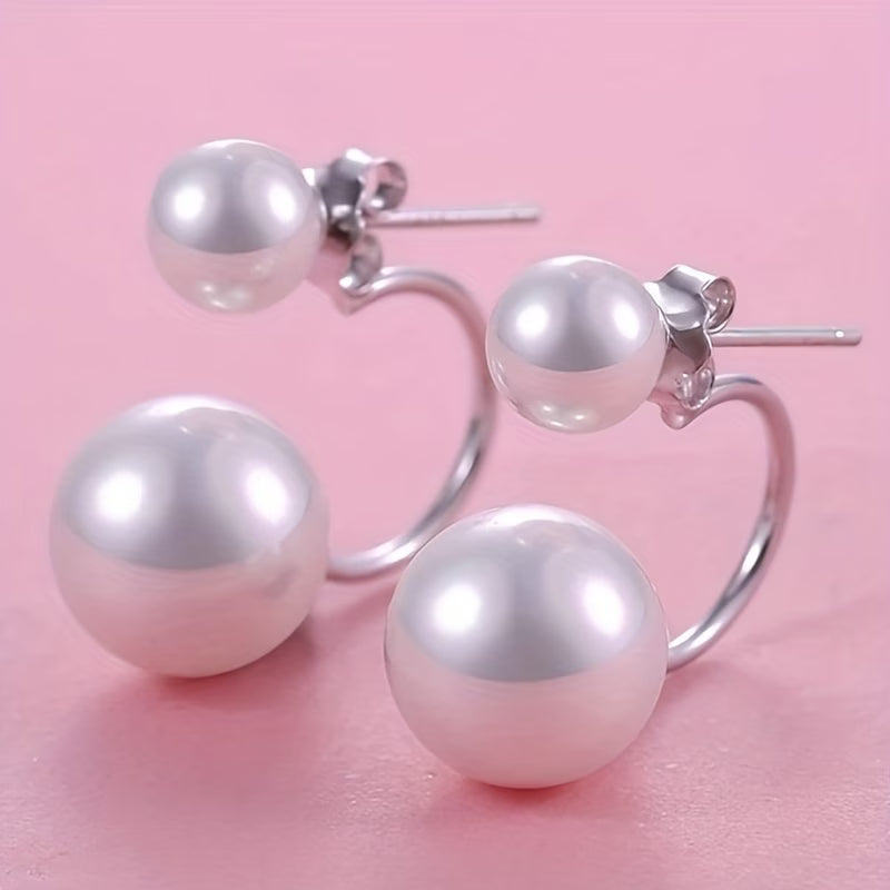Statement earrings with double pearl