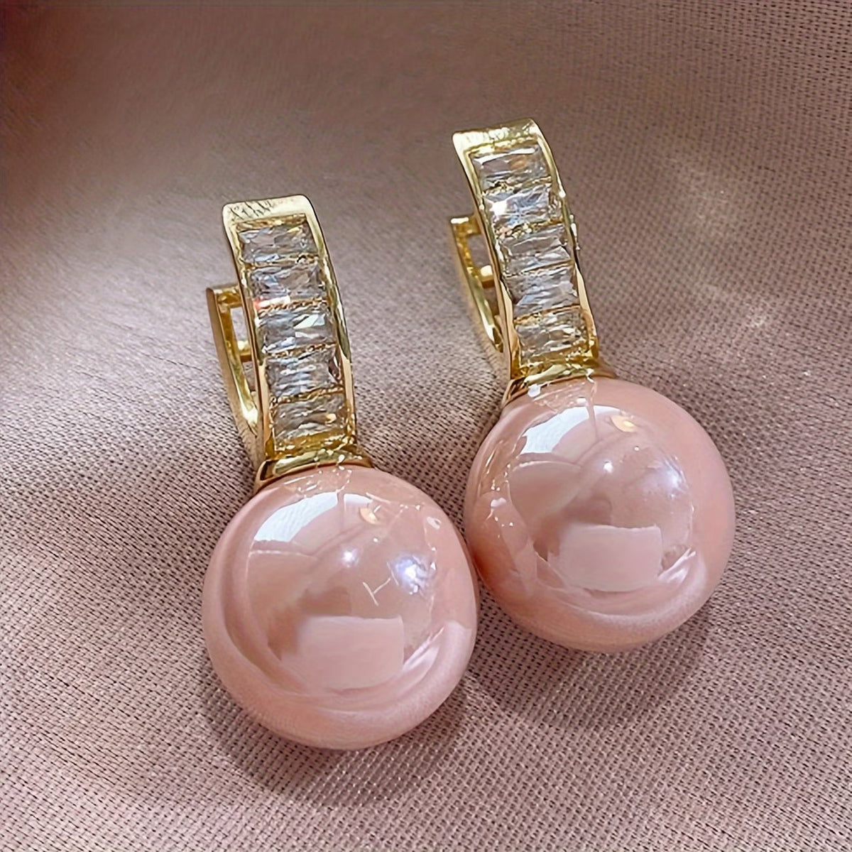 Earrings with pink pearl