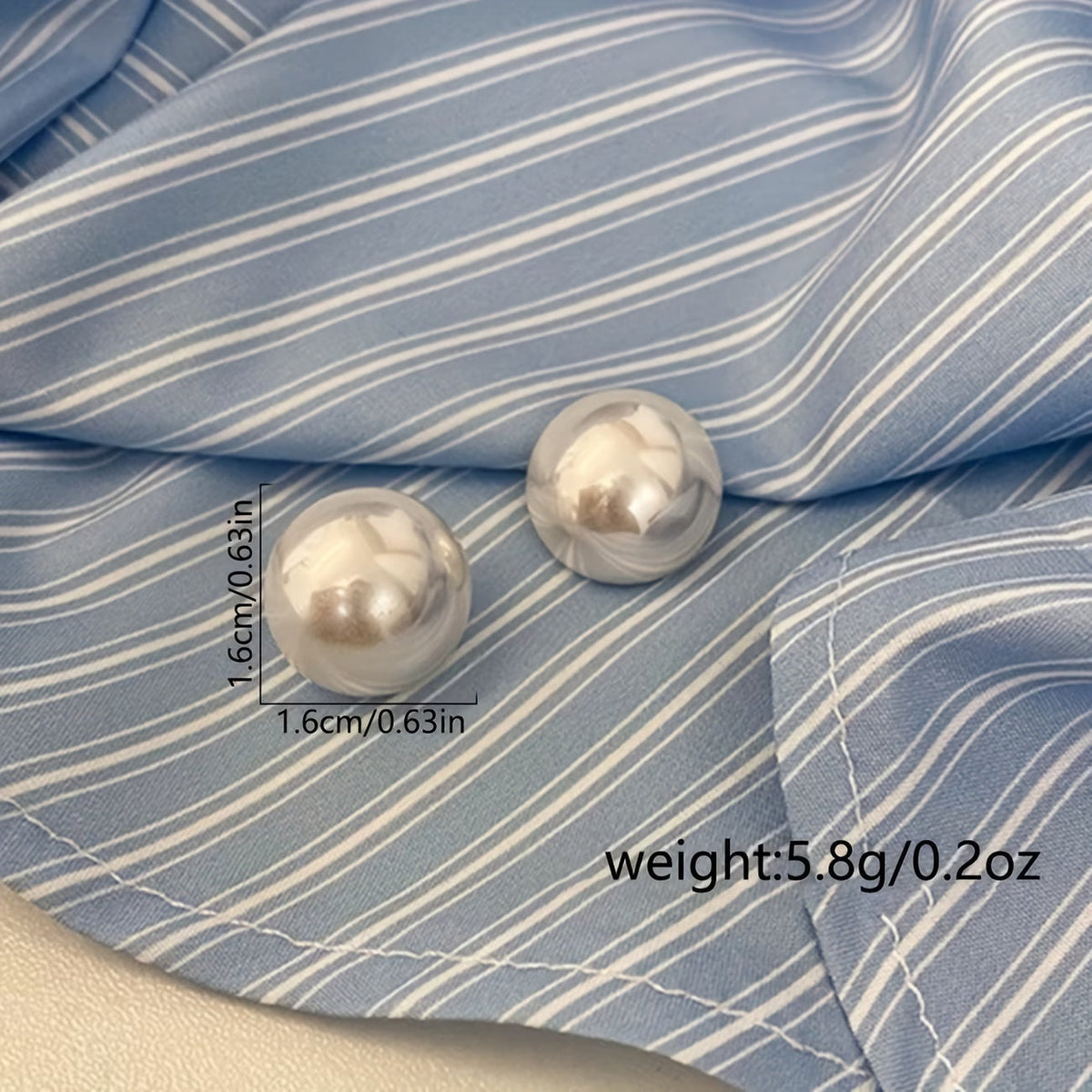 Statement earrings with pearl