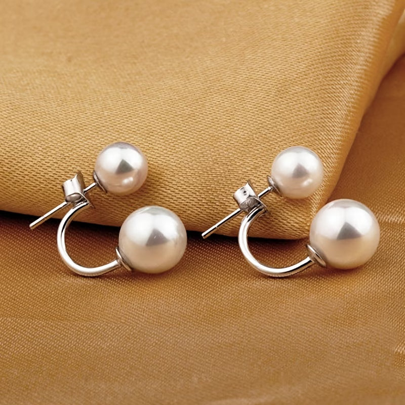 Statement earrings with double pearl