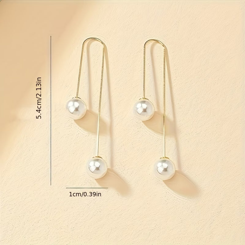 Statement earrings with radiant pearl