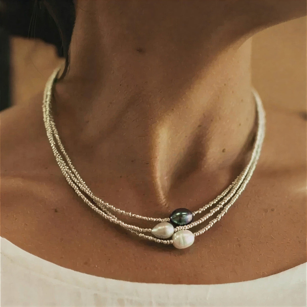 Multi-layer necklace with baroque pearls