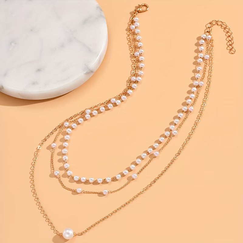 Trinity necklace set with three pearl layers