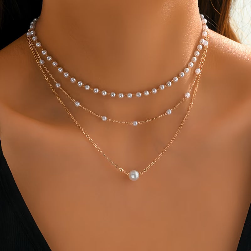 Trinity necklace set with three pearl layers
