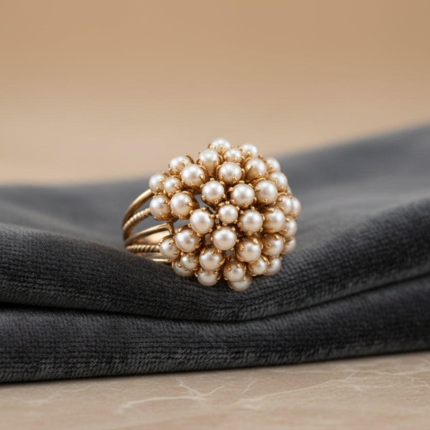 Classic gold ring with inlaid pearl