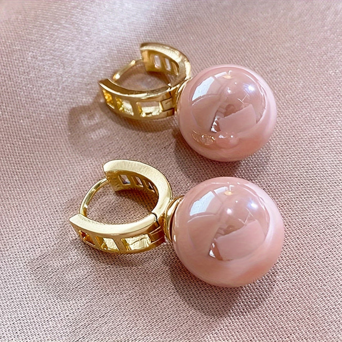 Earrings with pink pearl