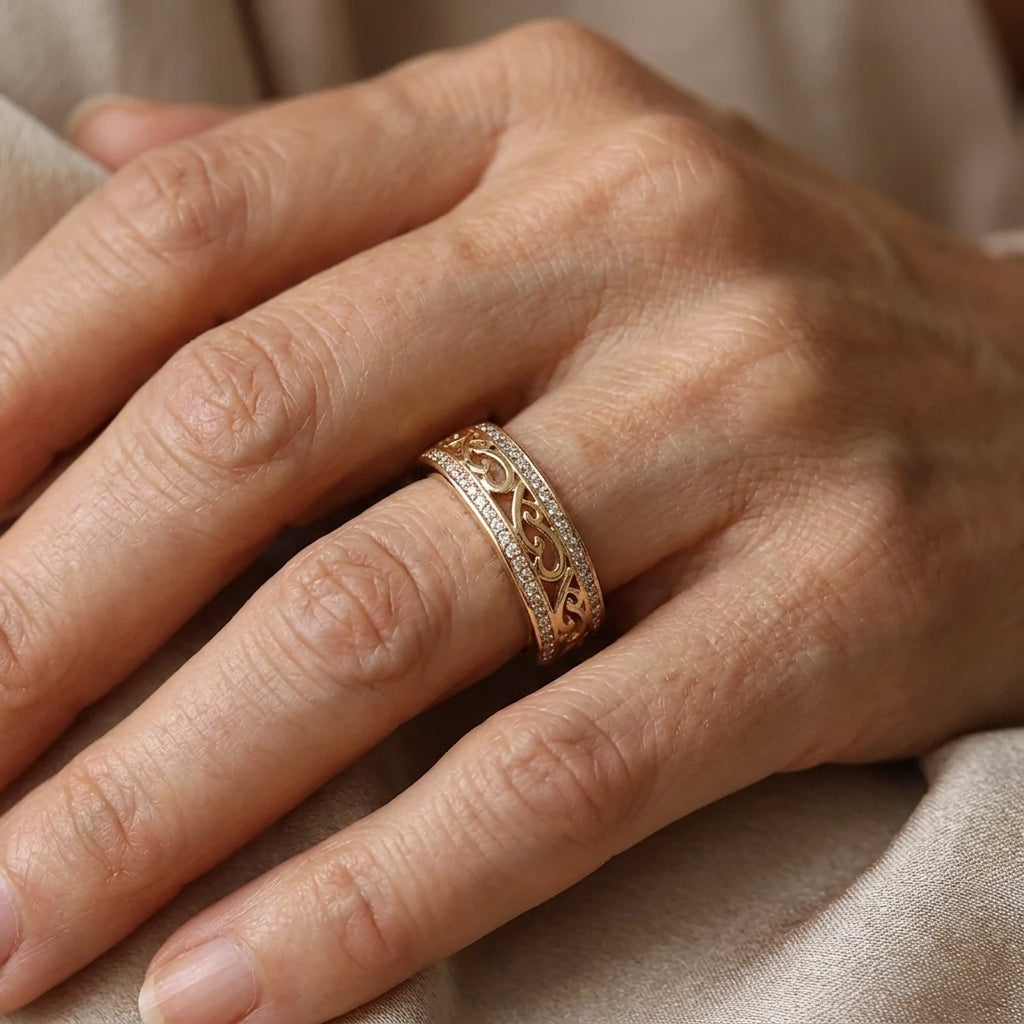 Filigree ring with swirl pattern and pavé stones