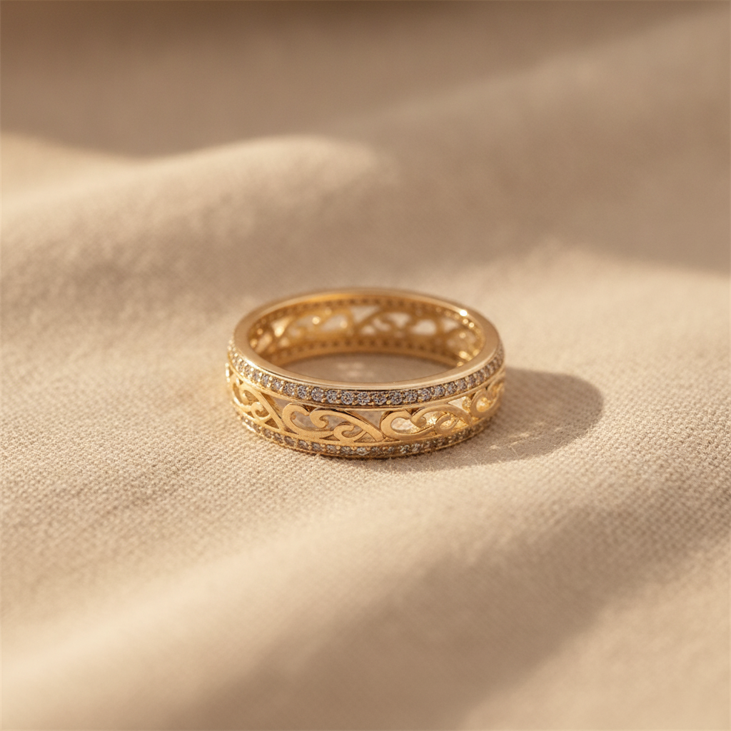 Filigree ring with swirl pattern and pavé stones