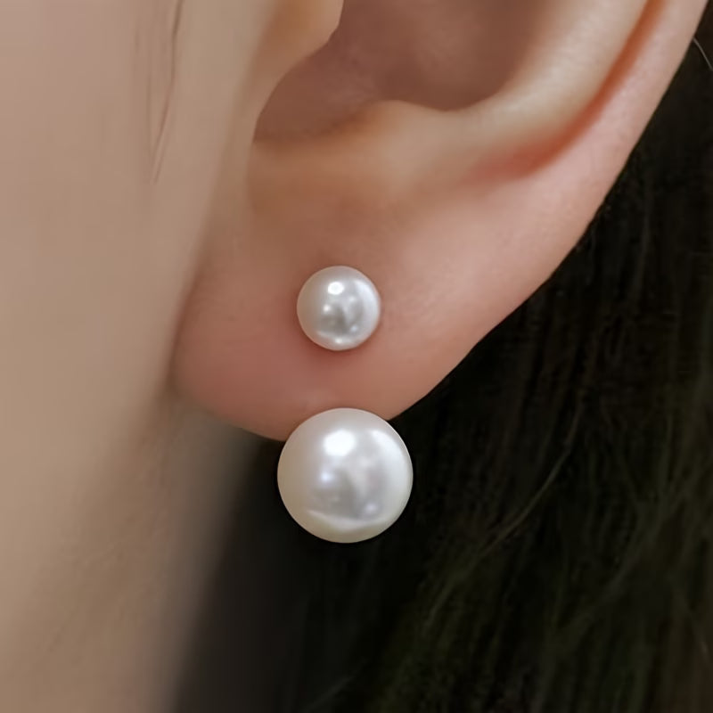 Statement earrings with double pearl