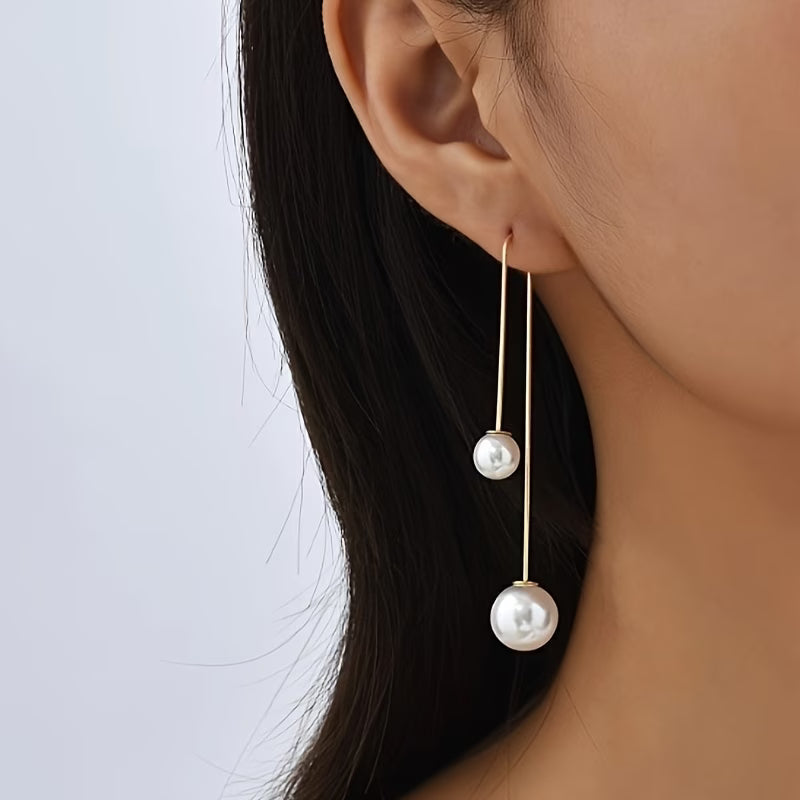 Statement earrings with radiant pearl