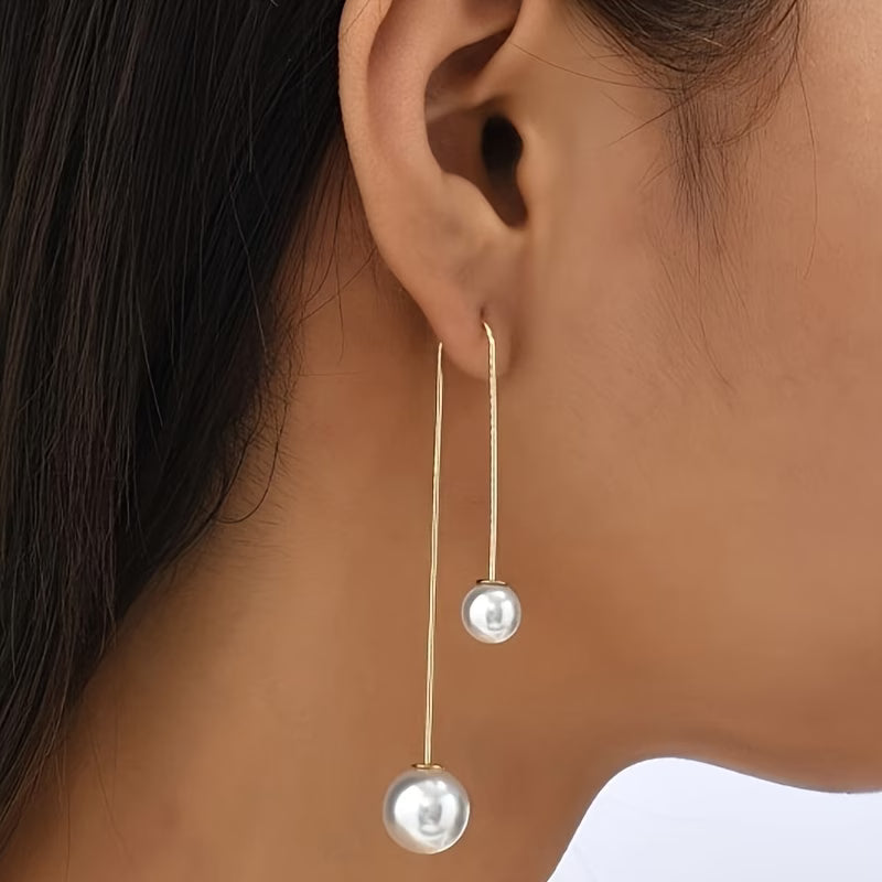 Statement earrings with radiant pearl