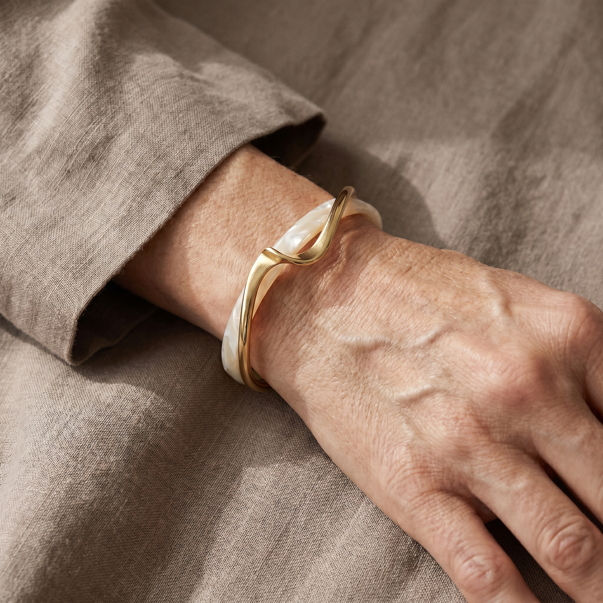 Elegant gold bracelet with white opal