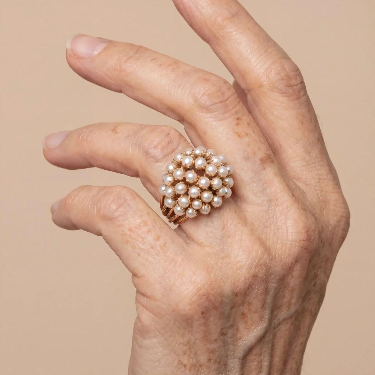 Classic gold ring with inlaid pearl