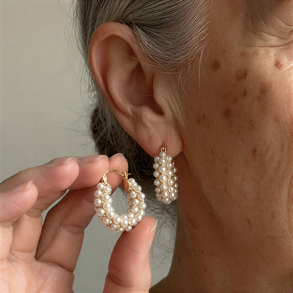 Hoop earrings with layered pearls